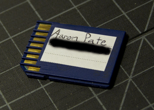 SD Card with a label originally intended for MiniDV tapes