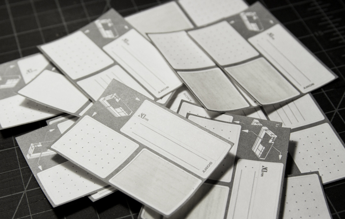 Pile of a dozen labels from MiniDV tapes