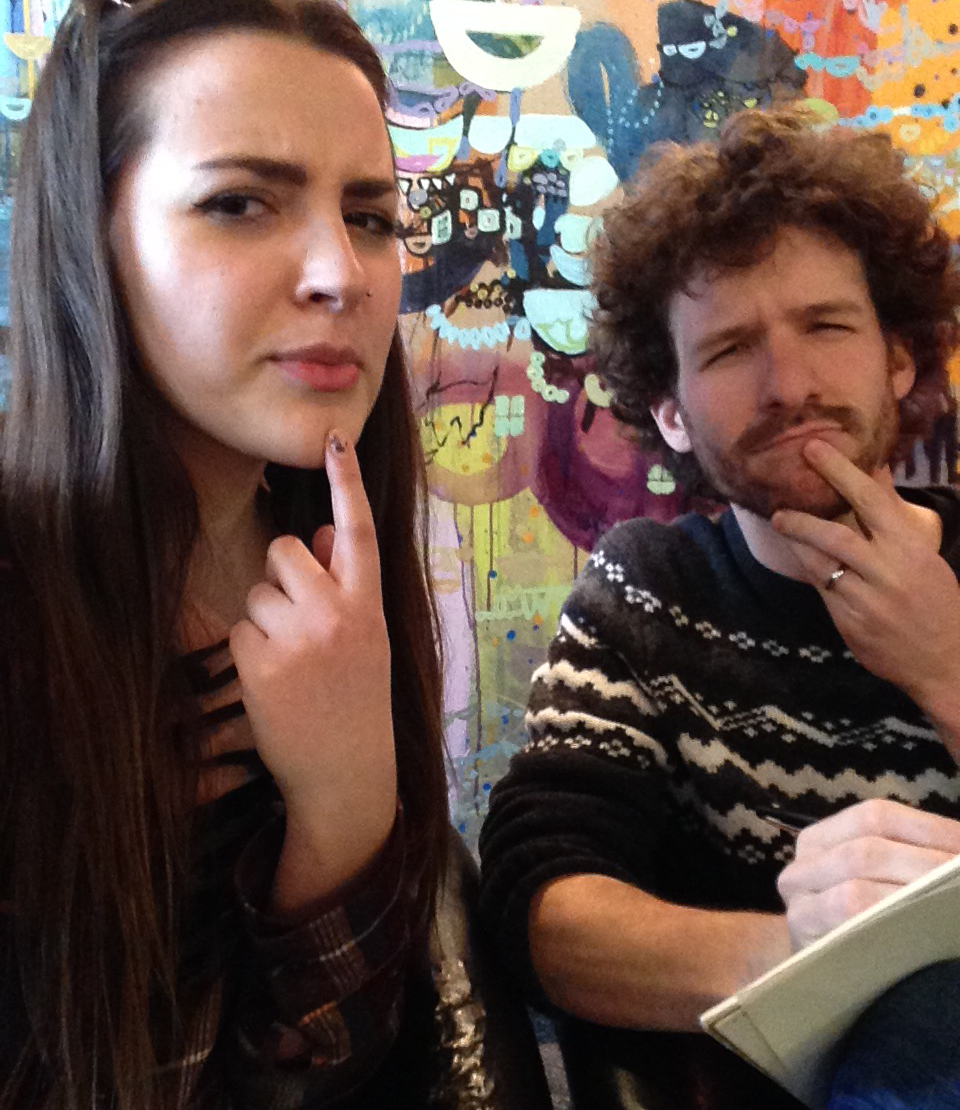 Mackenzie and Aaron pondering creative choices in a preproduction meeting