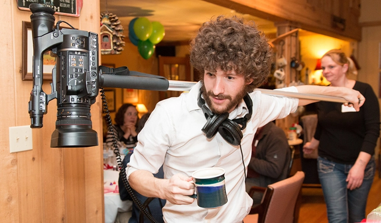Aaron Pate dual-weilding camera and coffee mug